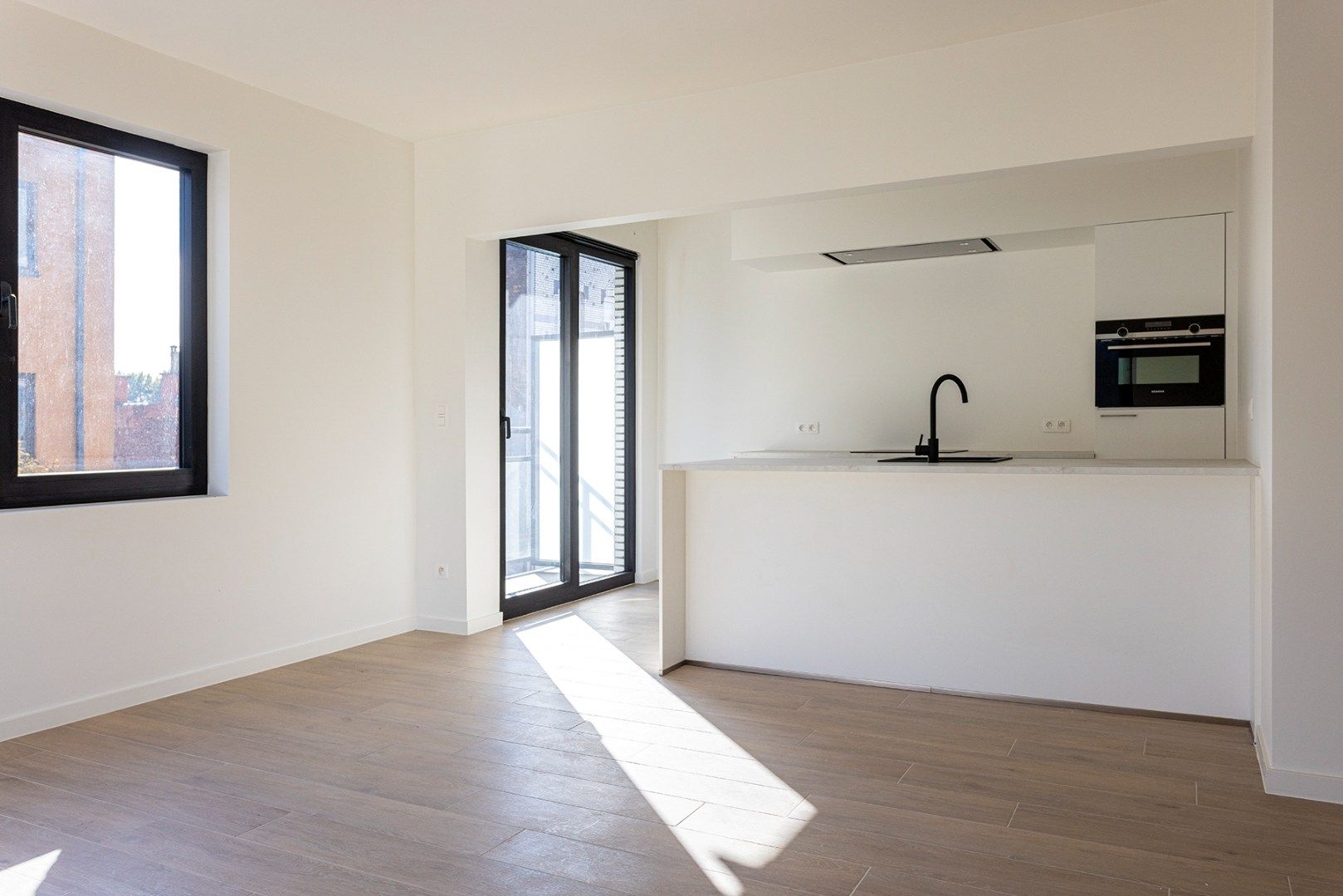 Vernieuwbouw appartement (2v) met 2 slaapkamers en terras! foto 6