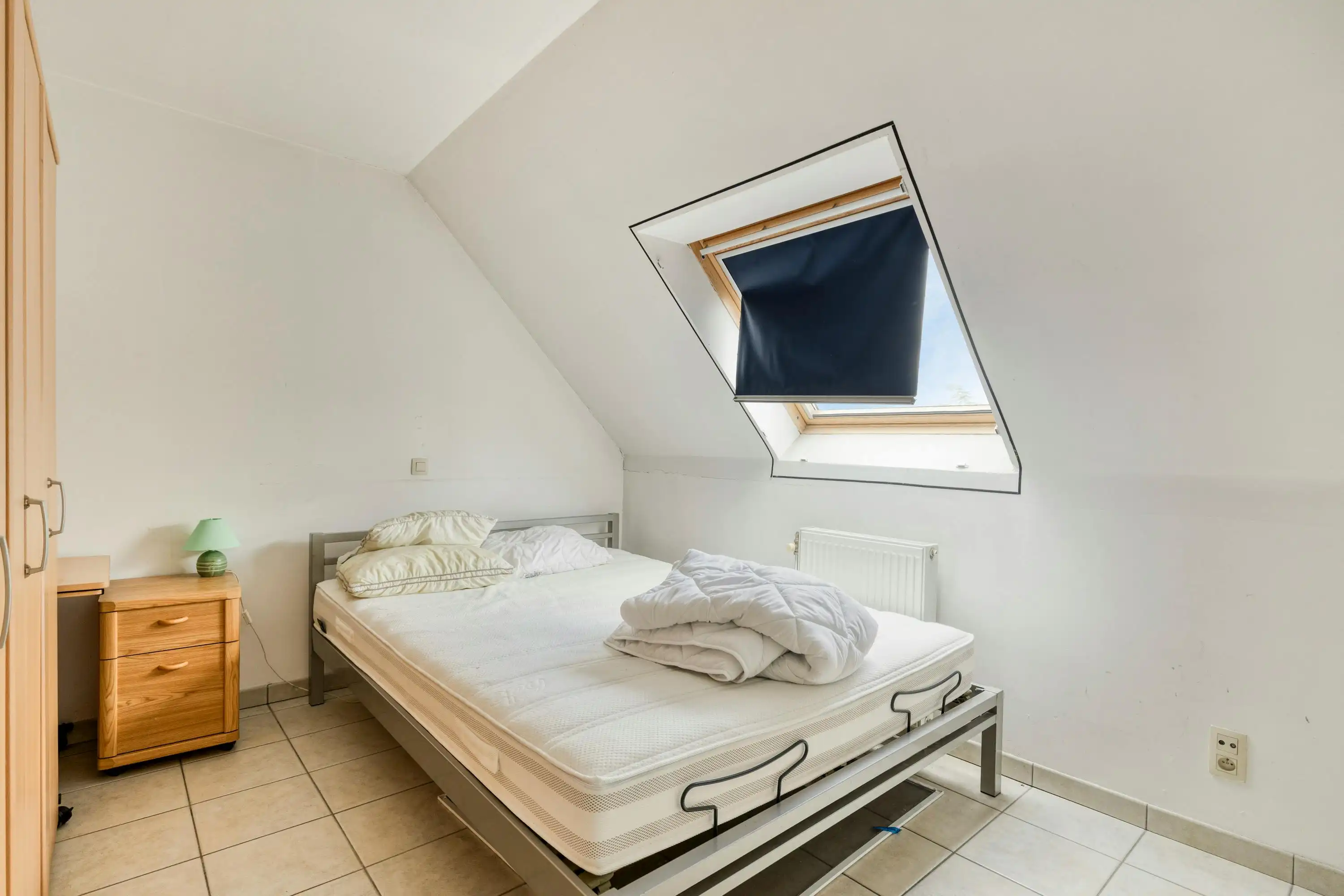 Instapklaar dakappartement met 2 slaapkamers in Roeselare foto 8