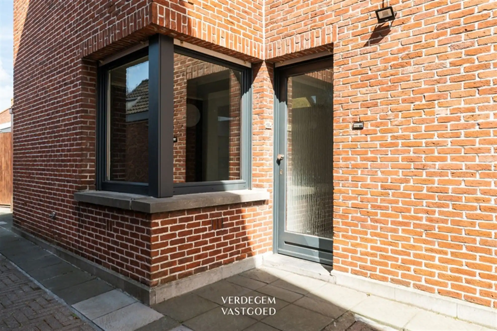 Opbrengsteigendom met 2 appartementen en 4 garages in het centrum van Sleidinge  foto 28
