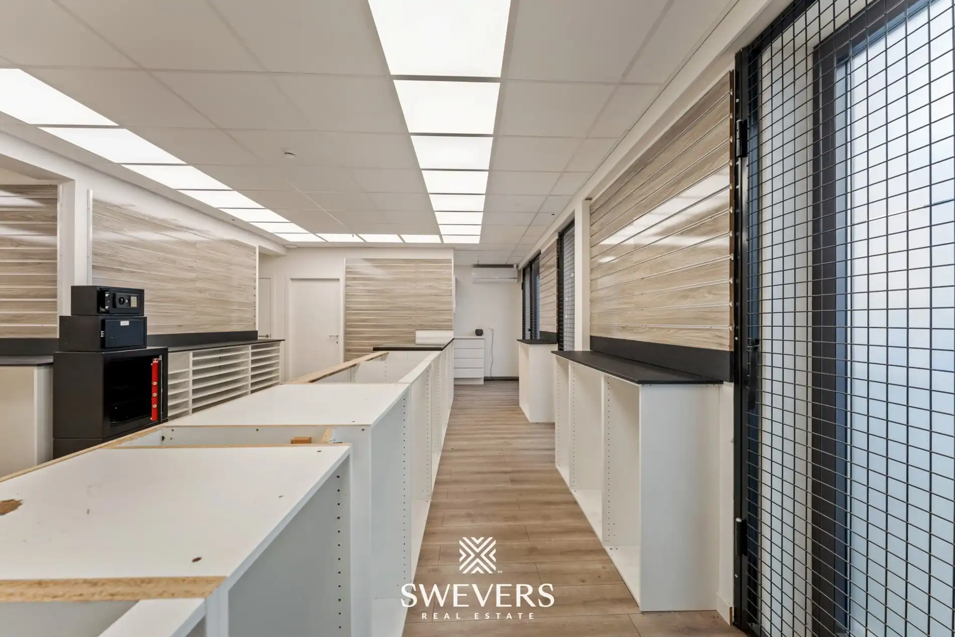 Uitzonderlijke mooi gelegen en ruime (391m²) handelsruimte in het volle centrum van Leopoldsburg foto 22