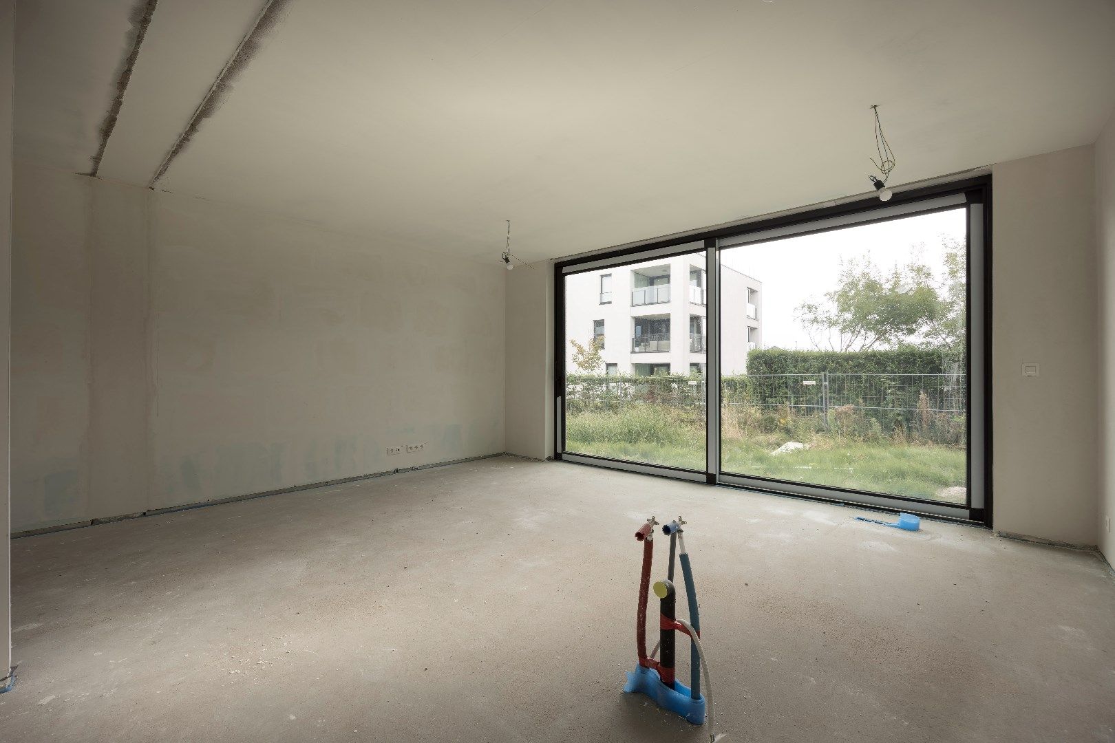 Nieuwbouw gelijkvloers appartement met zonnige tuin gelegen in "Residentie Dunique" te Bredene - duinen! foto 11