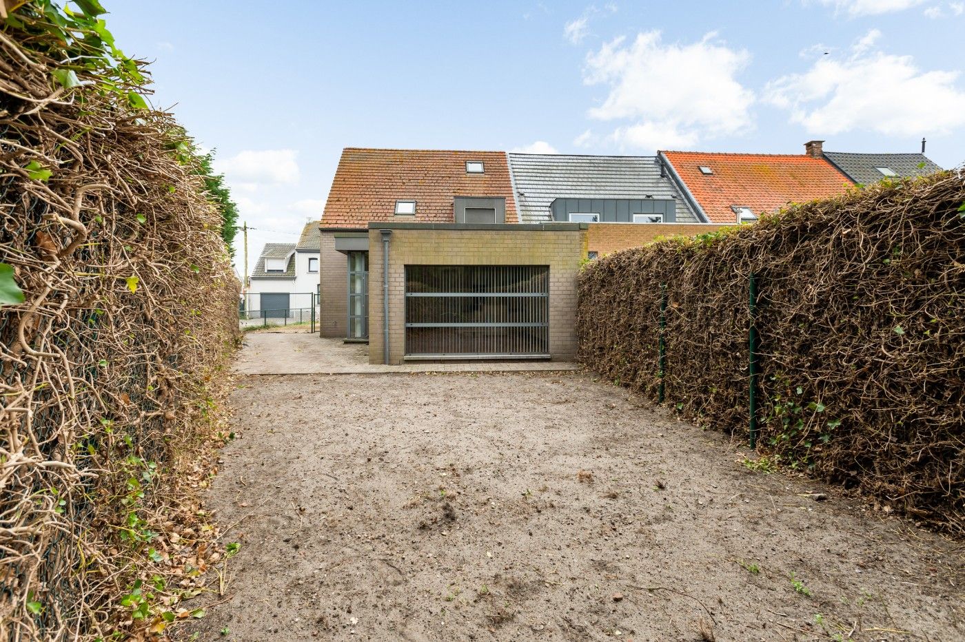 Ruime, instapklare woning met 3 slpk., dubbele garage en tuin foto 29