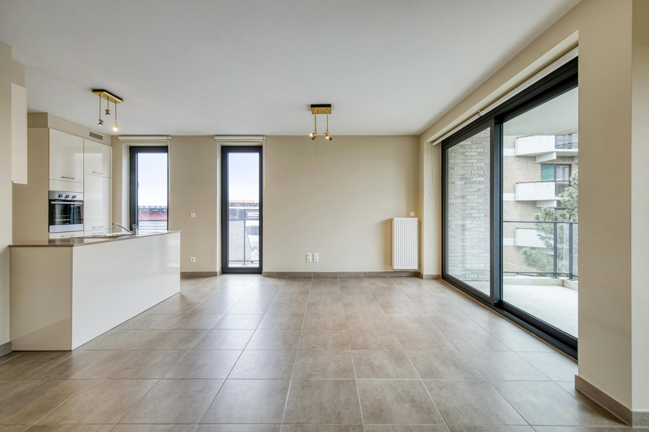 Instapklaar appartement te koop in centrum Waregem foto {{pictureIndex}}