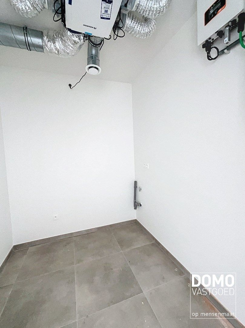 NIEUWBOUWAPPARTEMENT MET 2 SLAAPKAMERS, RUIM TERRAS, ONDERGRONDSE AUTOSTANDPLAATS EN KELDERBERGING IN MAASMECHELEN foto 12