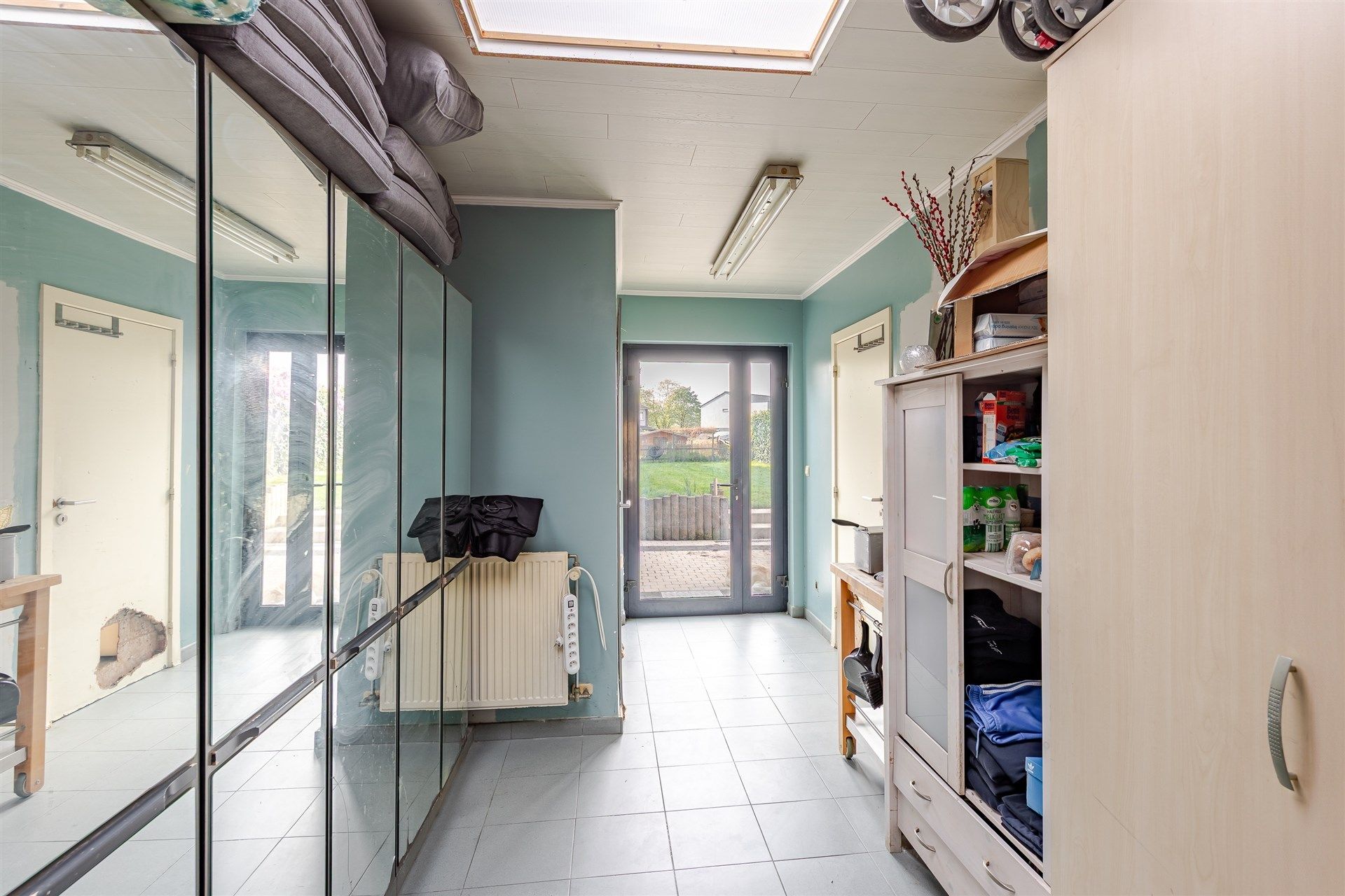 Bijzonder ruime woning met diepe tuin in Wetteren centrum foto 10