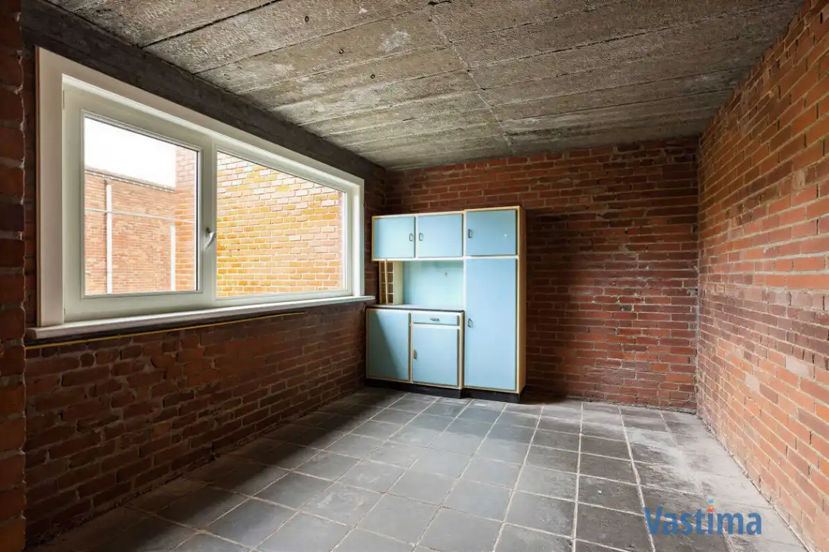 Woning met opslagruimte en grond op strategische ligging foto 12