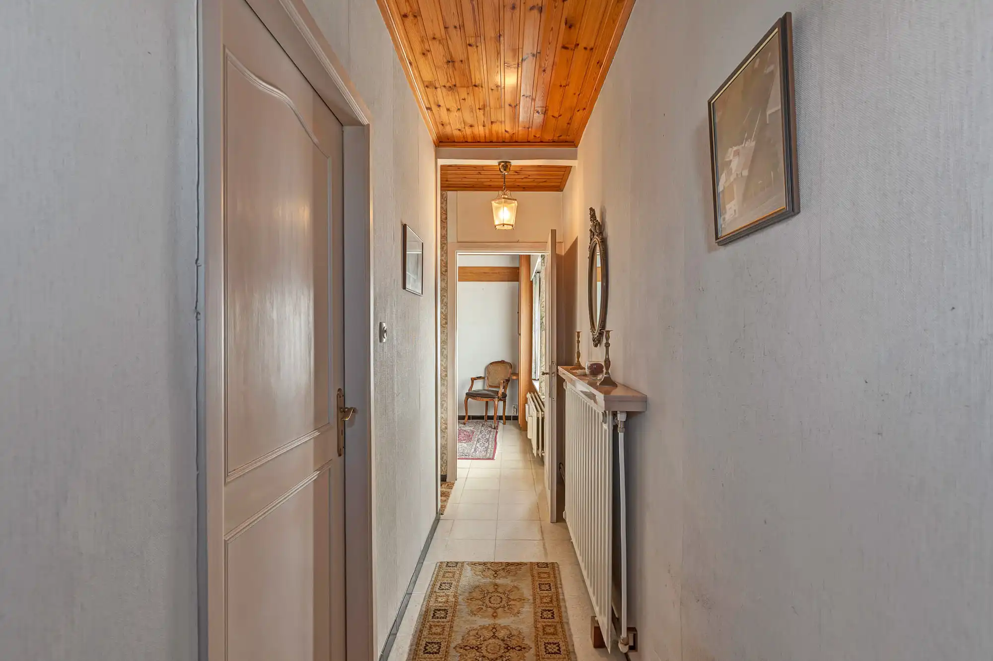 Te renoveren halfopen woning met garage en grote tuin foto 2