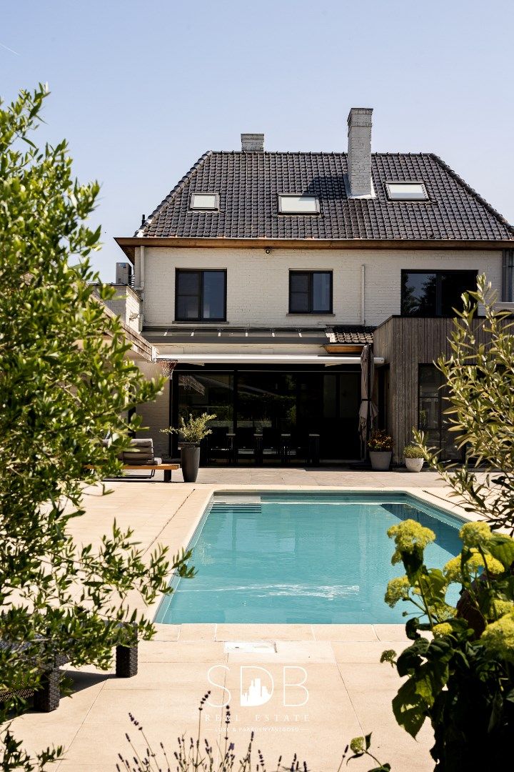Prachtige hedendaagse villa met gezinstuin en zwembad op 1.387m² foto 20