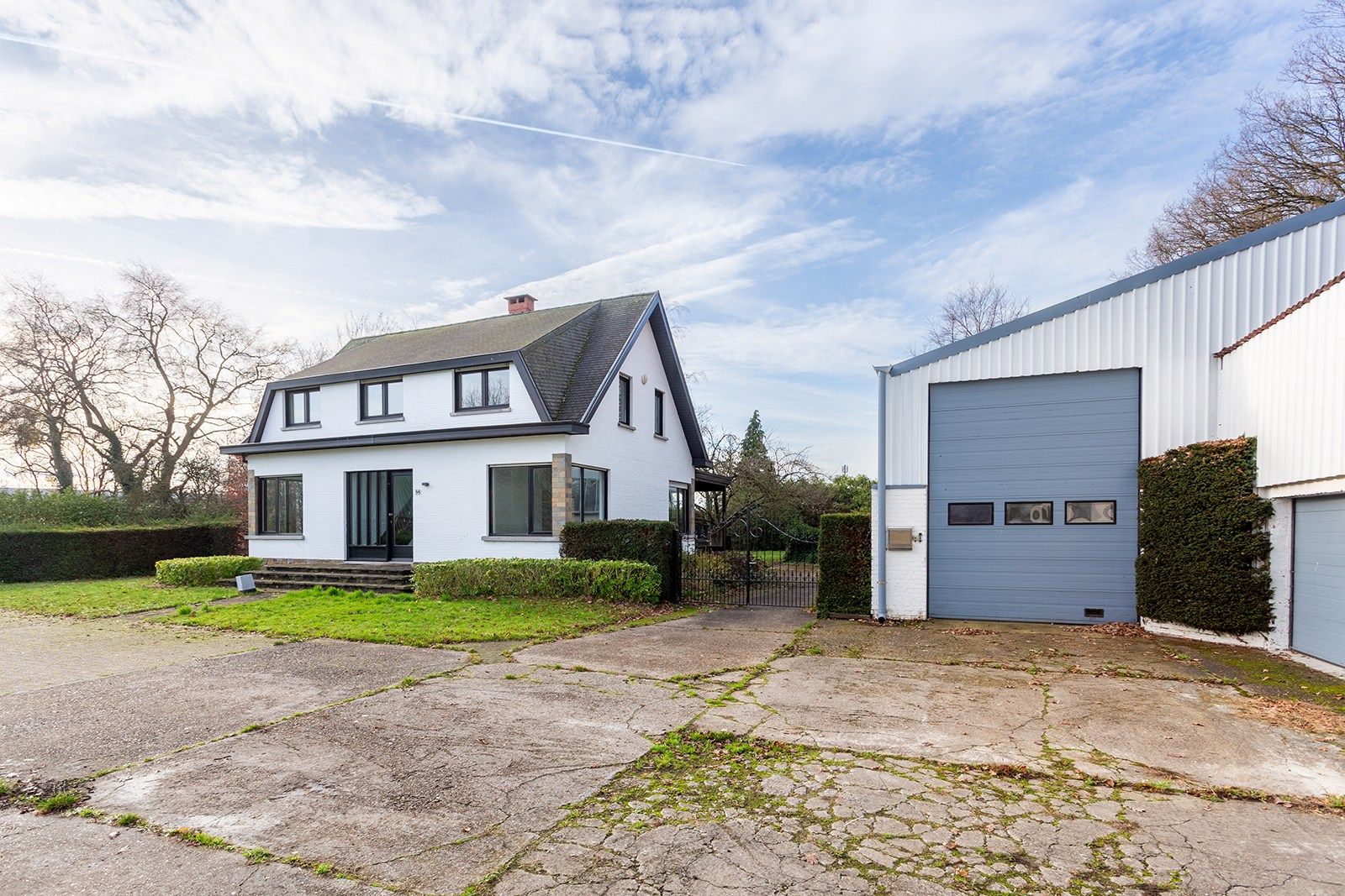 Villa met grote tuin, magazijn én weiland foto 18