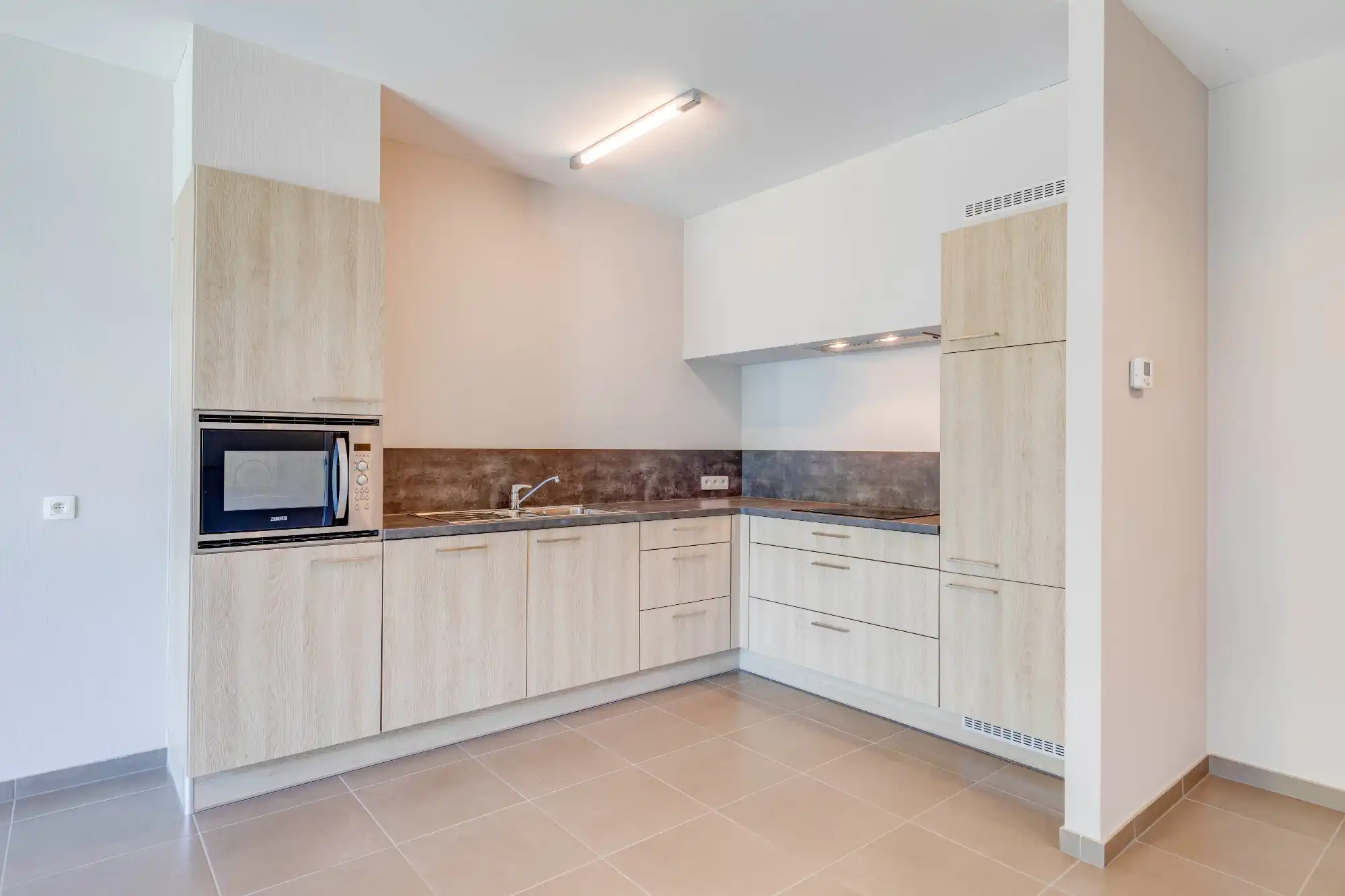 Energiezuinige assistentiewoning met autostaanplaats en groene omgeving foto 5