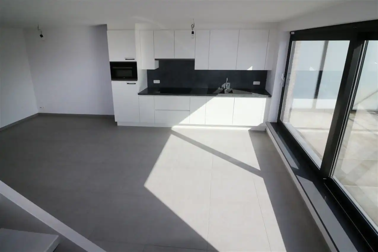 Nieuwbouwappartement met groot zuidgericht terras, 2 slpk. en autostaanplaats binnen foto 9