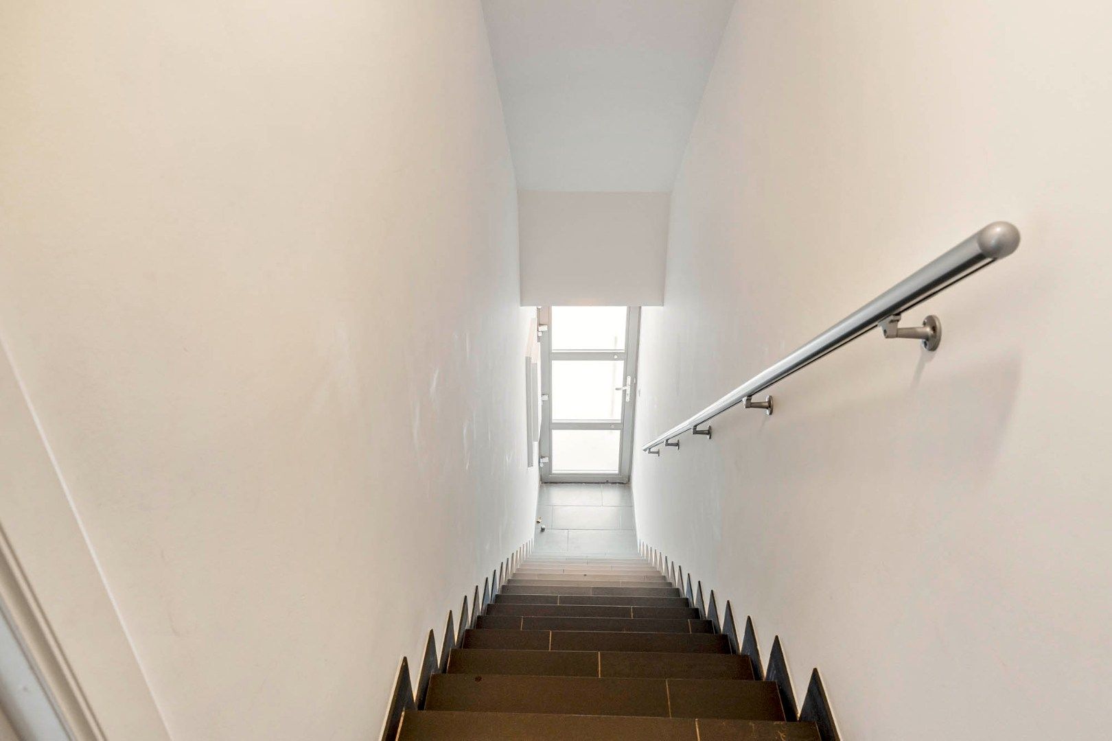 Energiezuinig 1-slaapkamerappartement met private toegang en knusse patio, centrum  Opglabbeek - interessante investeringsopportuniteit. foto 3