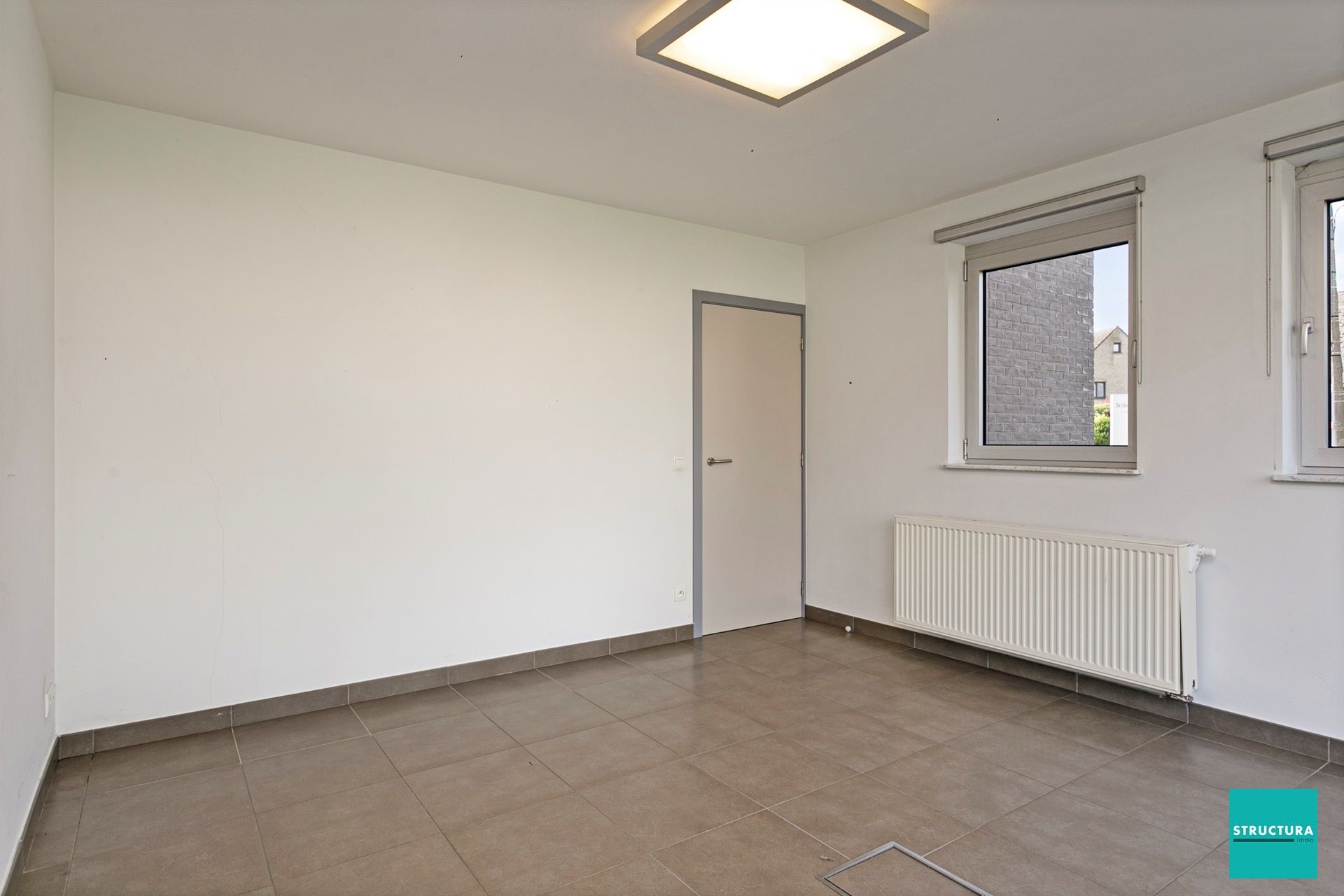 Woning met handelsgelijkvloers foto 12