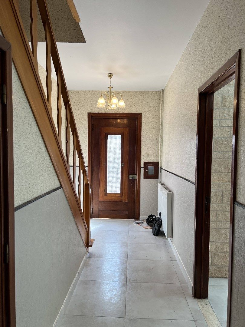 Goed gelegen rijwoning met tuintje foto 2
