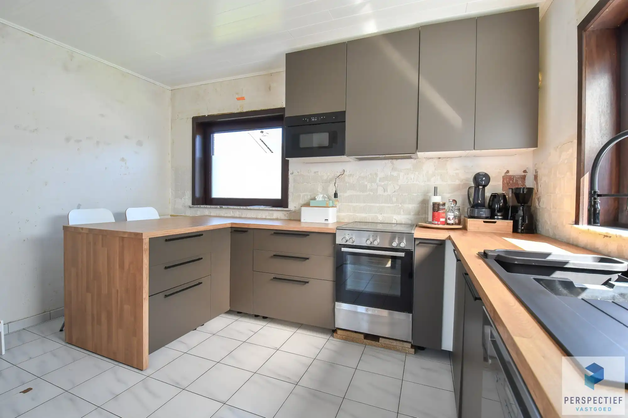 Centraal gelegen ruime woning met 3 slaapkamers - garage en grote tuin op 615 m² foto 16