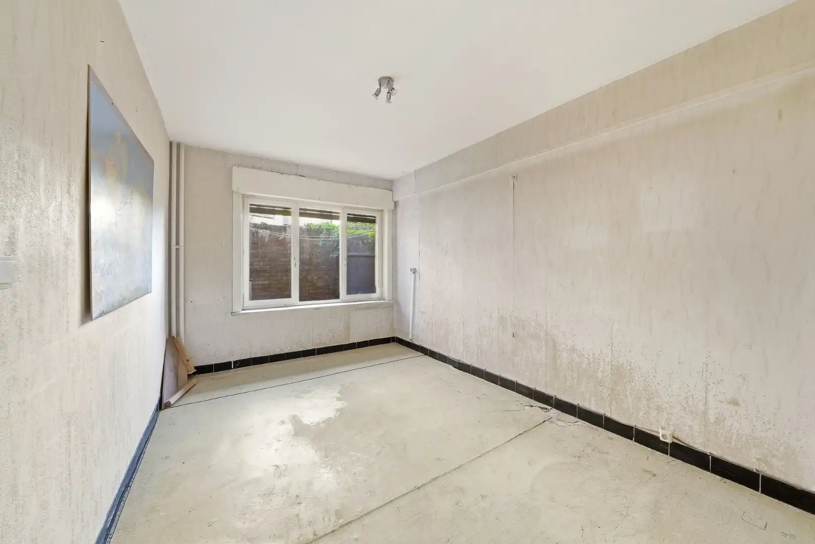 Te renoveren gelijkvloers appartement met 2 slaapkamers in Oostende foto 11