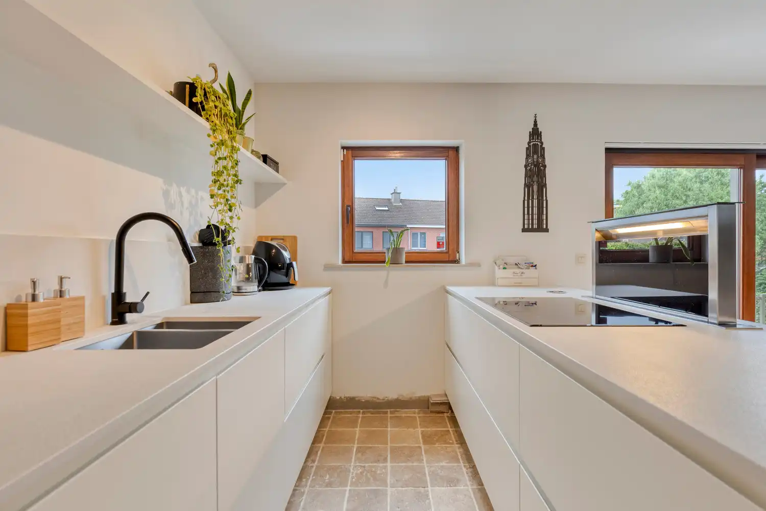 Instapklare split-level woning in de gegeerde wijk Rietschoorvelden te Merksem! foto 8