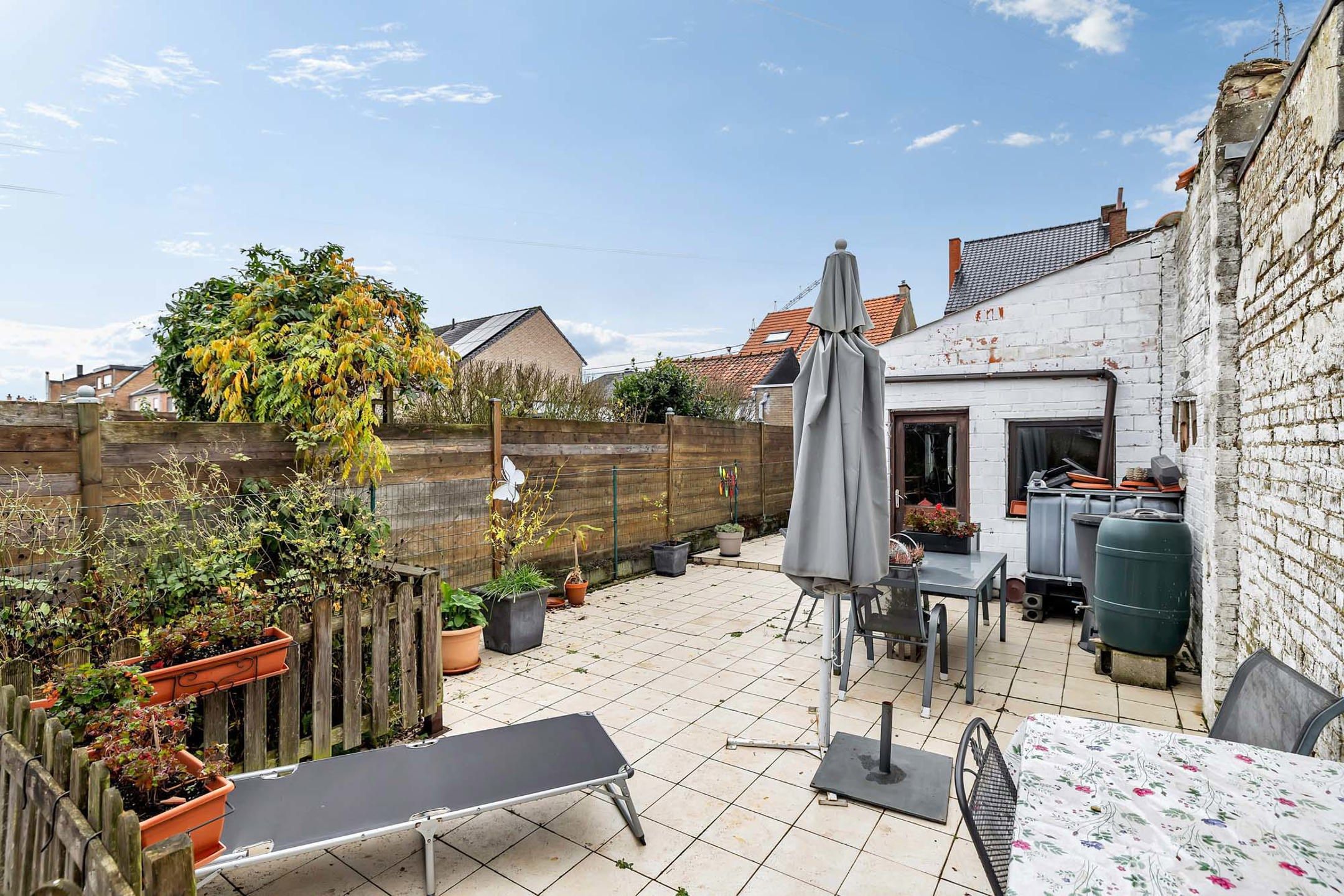 Ruime instapklare woning met 3 slpks en tuin foto 26