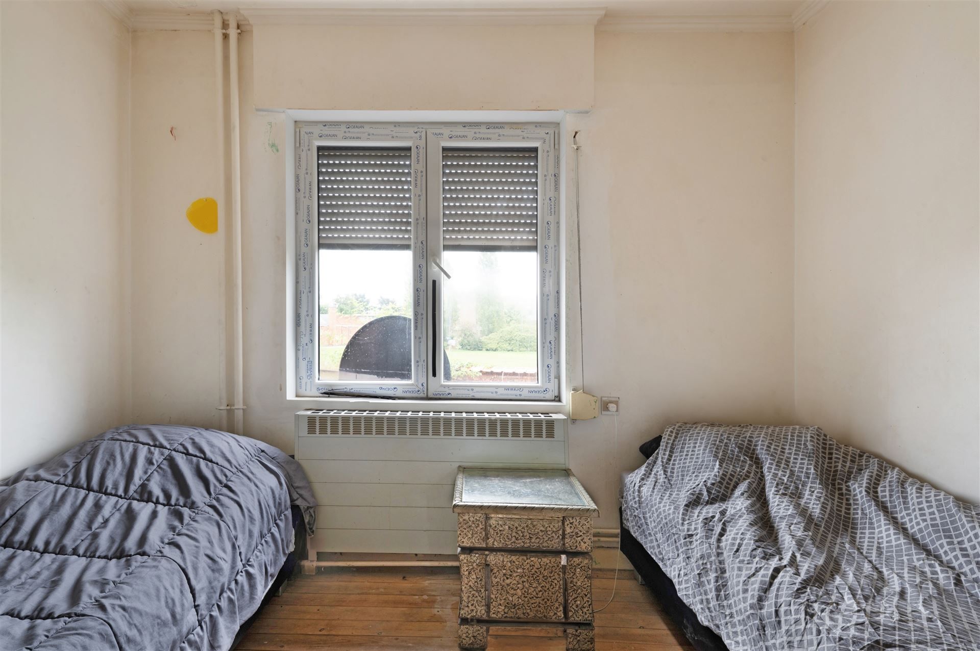 Te renoveren woning met tuin en 3 slaapkamers in Gent! foto 9