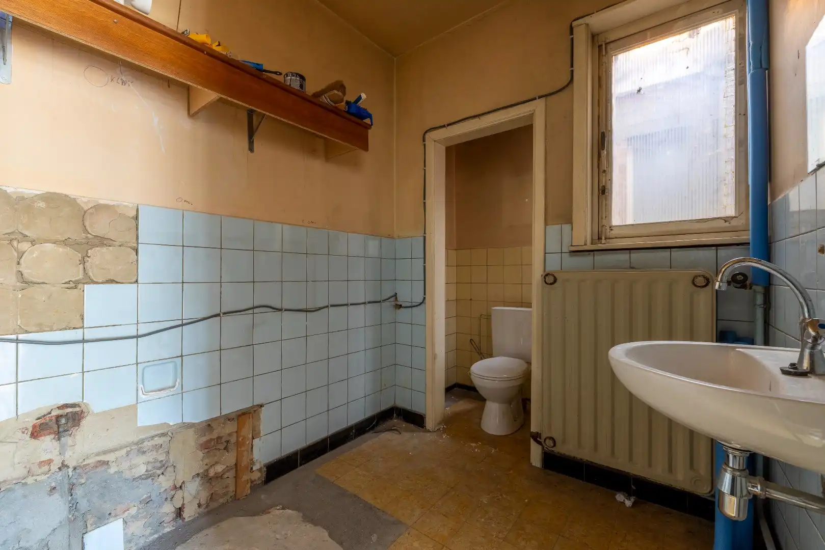Top gelegen handelspand aan de Markt te Zele foto 15