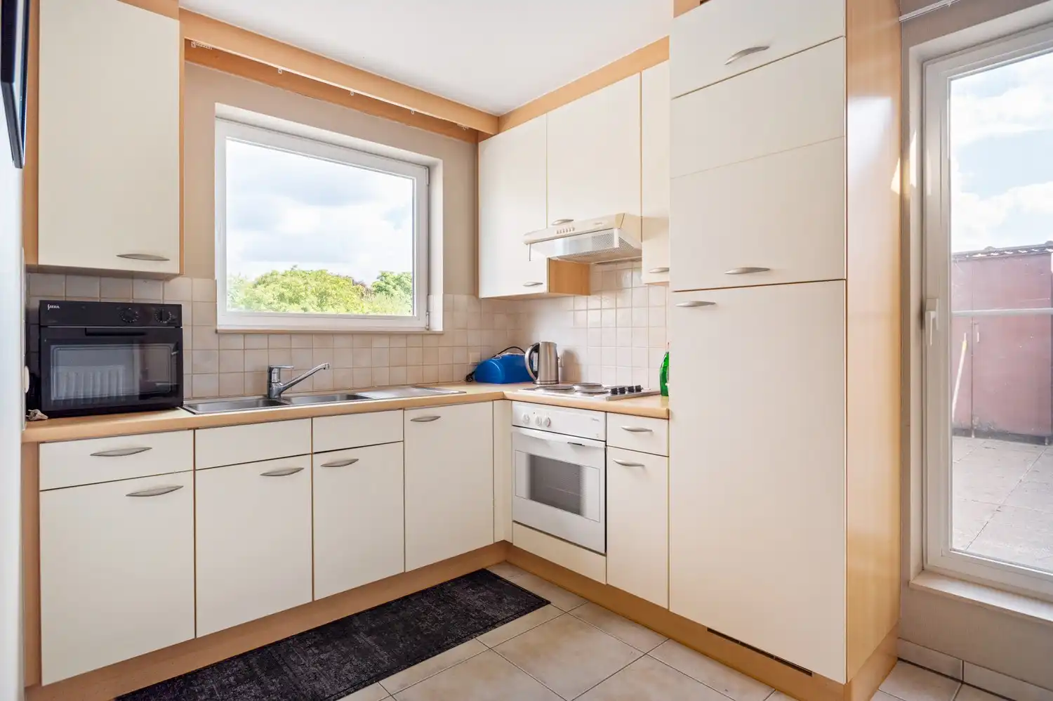 Opbrengsteigendom of co-housing met 2 ruime appartementen in het centrum van Broechem! foto 32