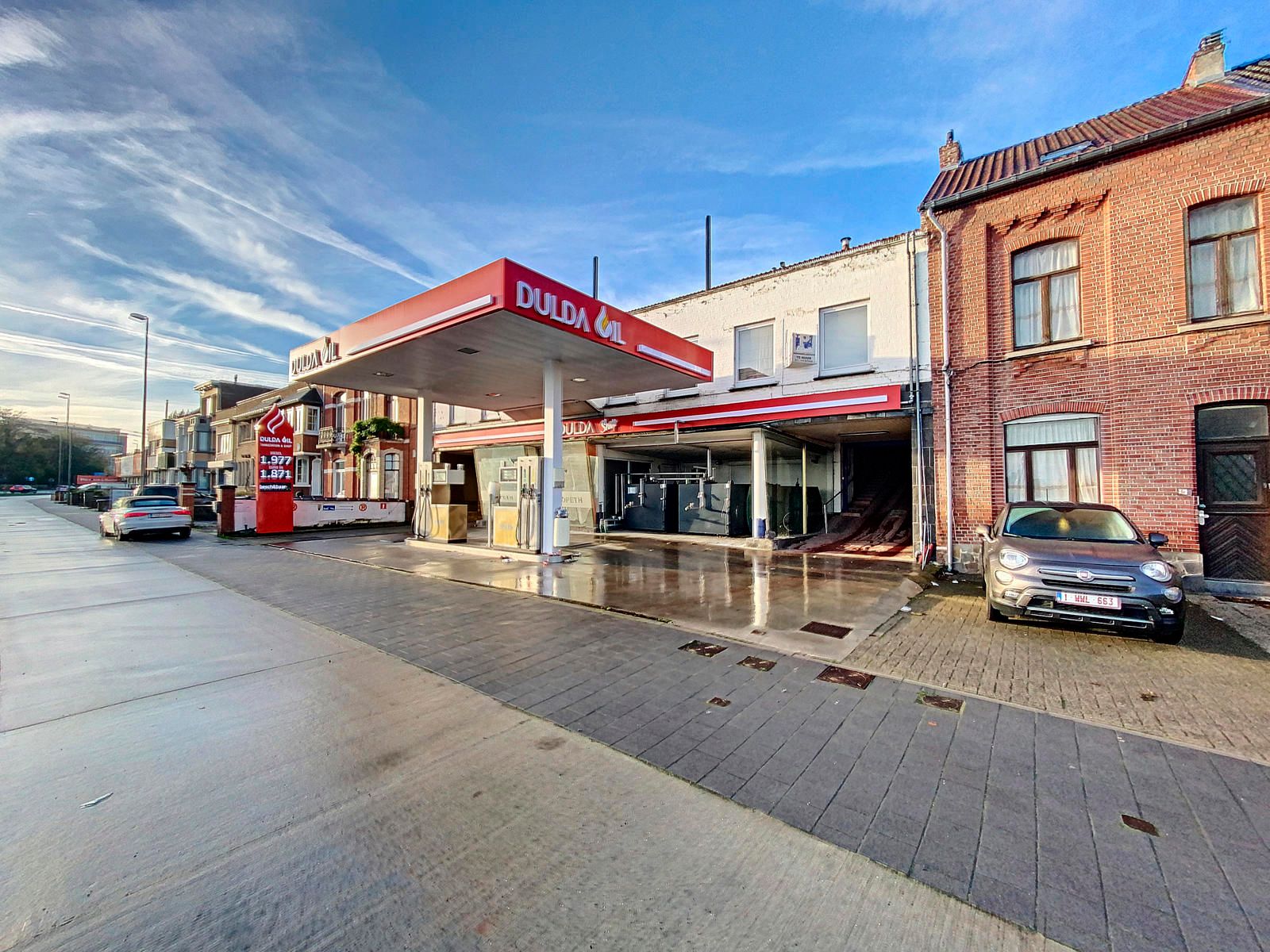 Tankstation met 2 appt en 10+ parkeerplaatsen.  foto 37