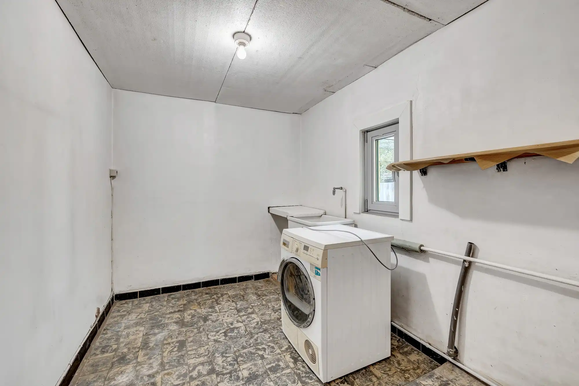 Halfopen bebouwing met garage en tuin in Ternat! foto 14