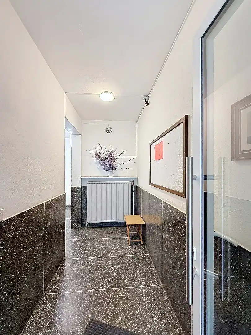 Stijlvol gerenoveerd appartement met terras in centrum Tienen foto 17