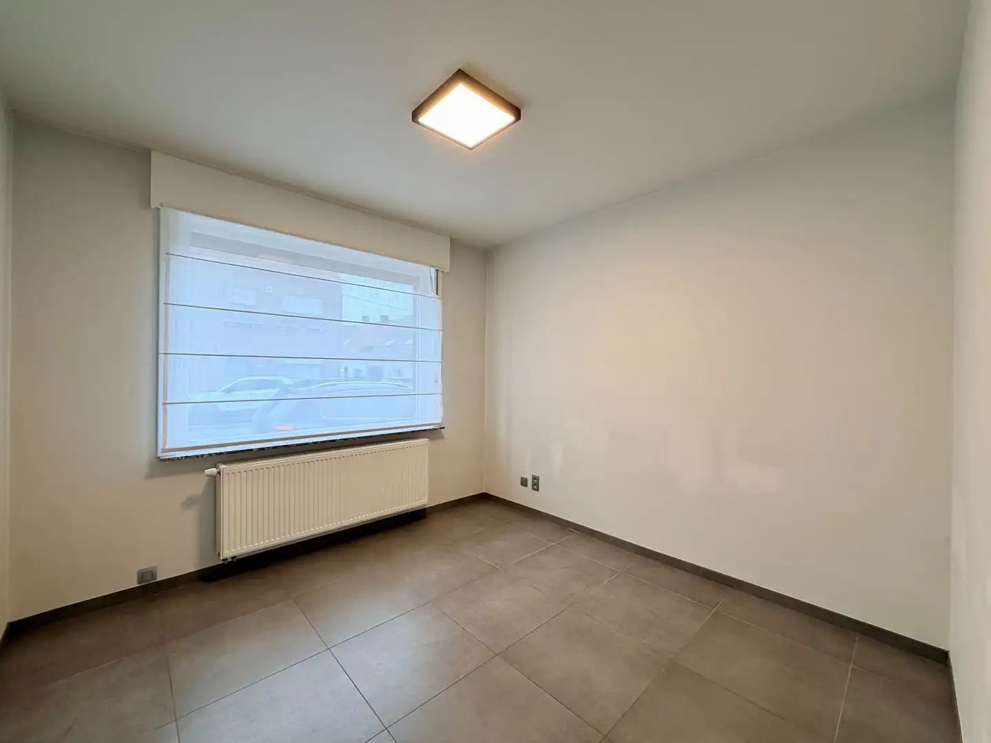 Instapklare woning met 2 slaapkamers en diepe tuin te Roeselare! foto 2