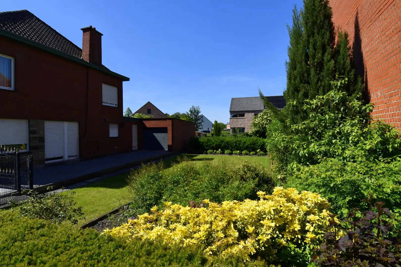 Halfopen bebouwing mét aanliggend lot bouwgrond te koop vlakbij centrum Menen foto 12