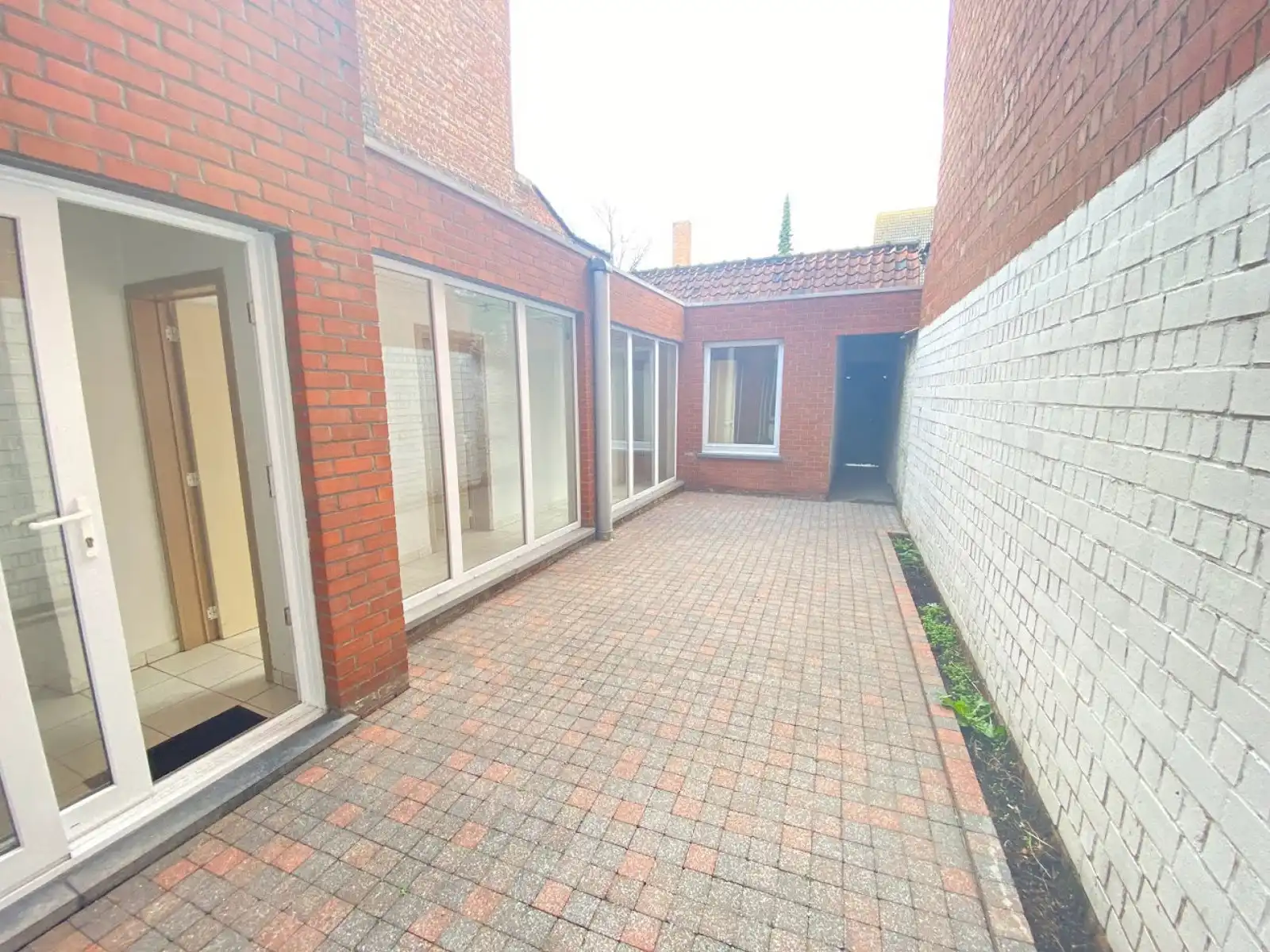 Huis met 3 entiteiten, garage en uitweg foto 6