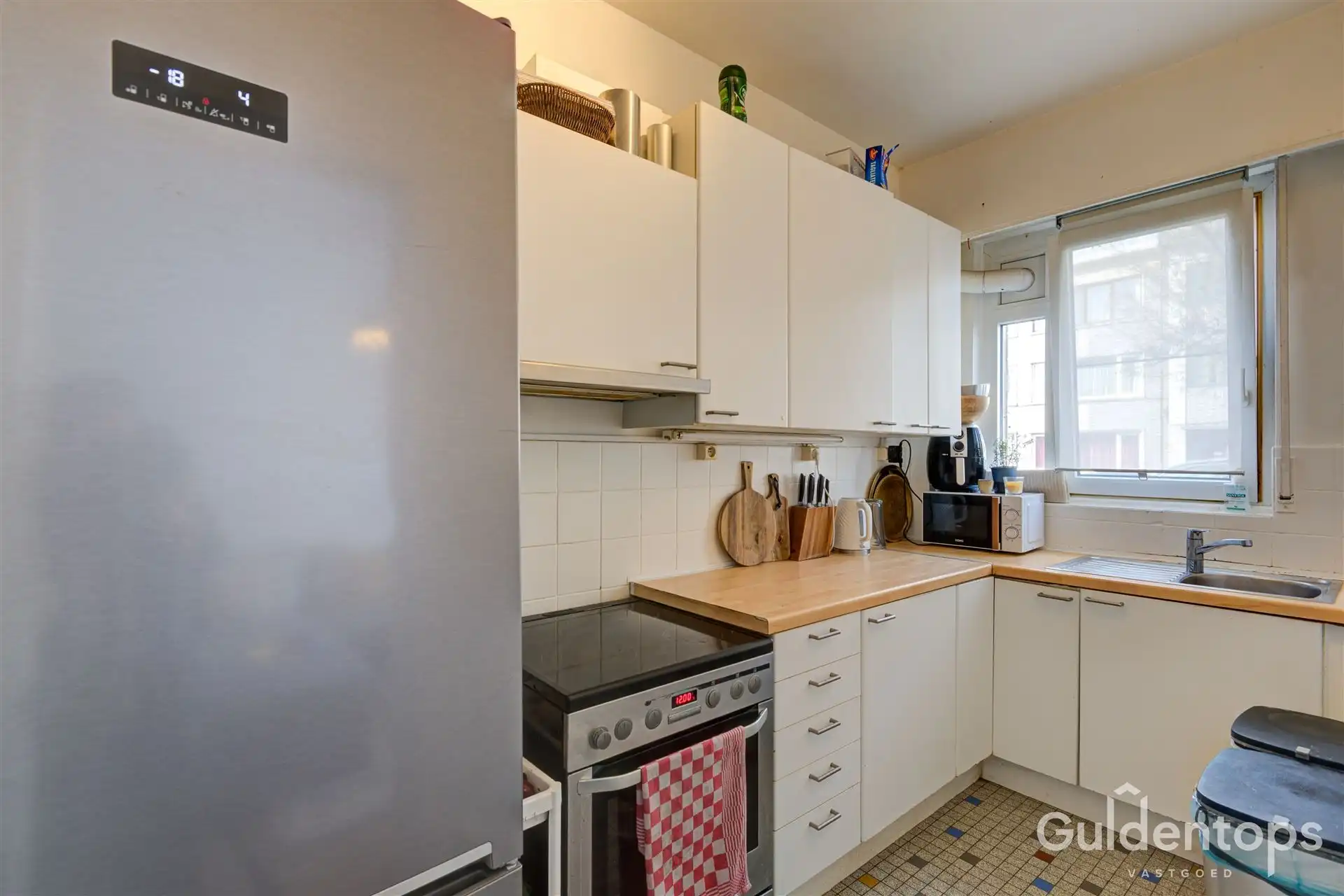 zeer goed gelegen ruim 2 slaapkamerappartement mét tuin foto 14