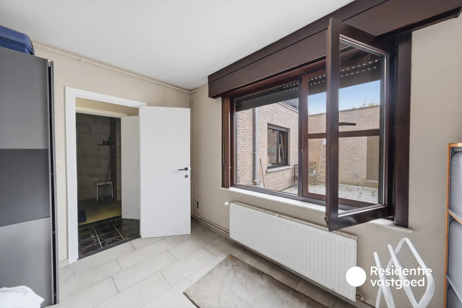 Opbrengsteigendom met 3 appartementen, garage en zonnig terras foto 18