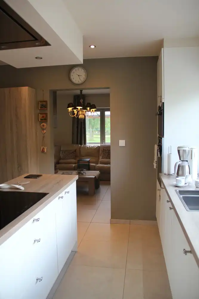 Instapklare gerenoveerde woning op 11a 75ca met prachtige, zuidgerichte tuin aan natuurgebied De Maten in Genk. foto 14
