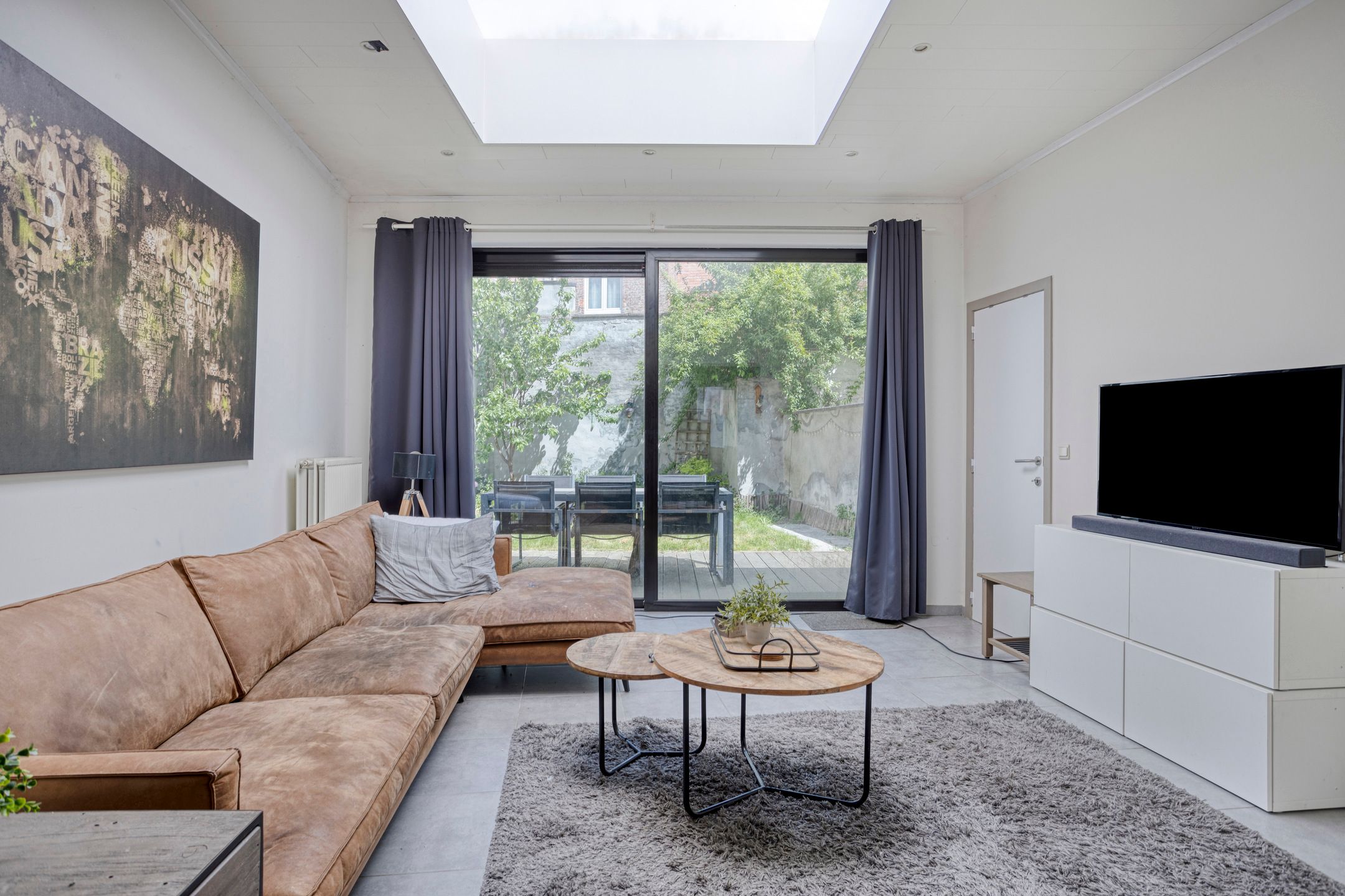 Gelijkvloersappartement met tuin en terras te centrum Leuven foto {{pictureIndex}}