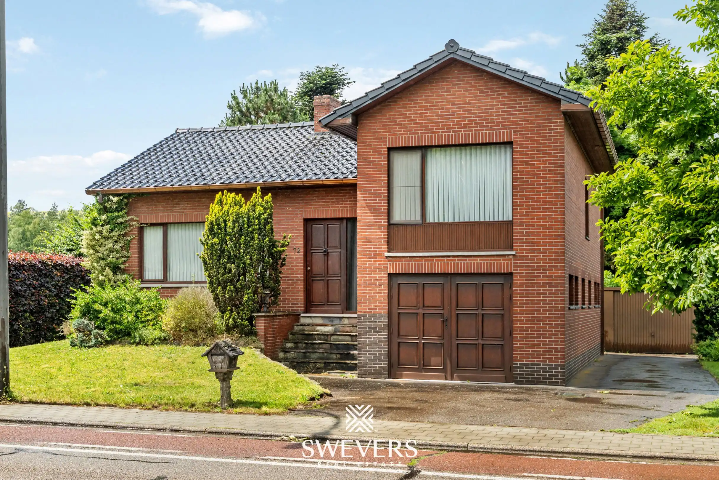 Woning met potentieel op groen perceel te Heppen foto 3