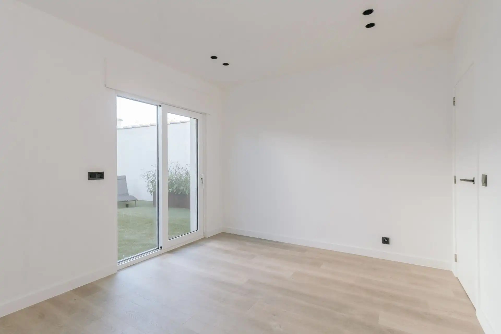 Gelijkvloersappartement met tuintje en garagebox! foto 11