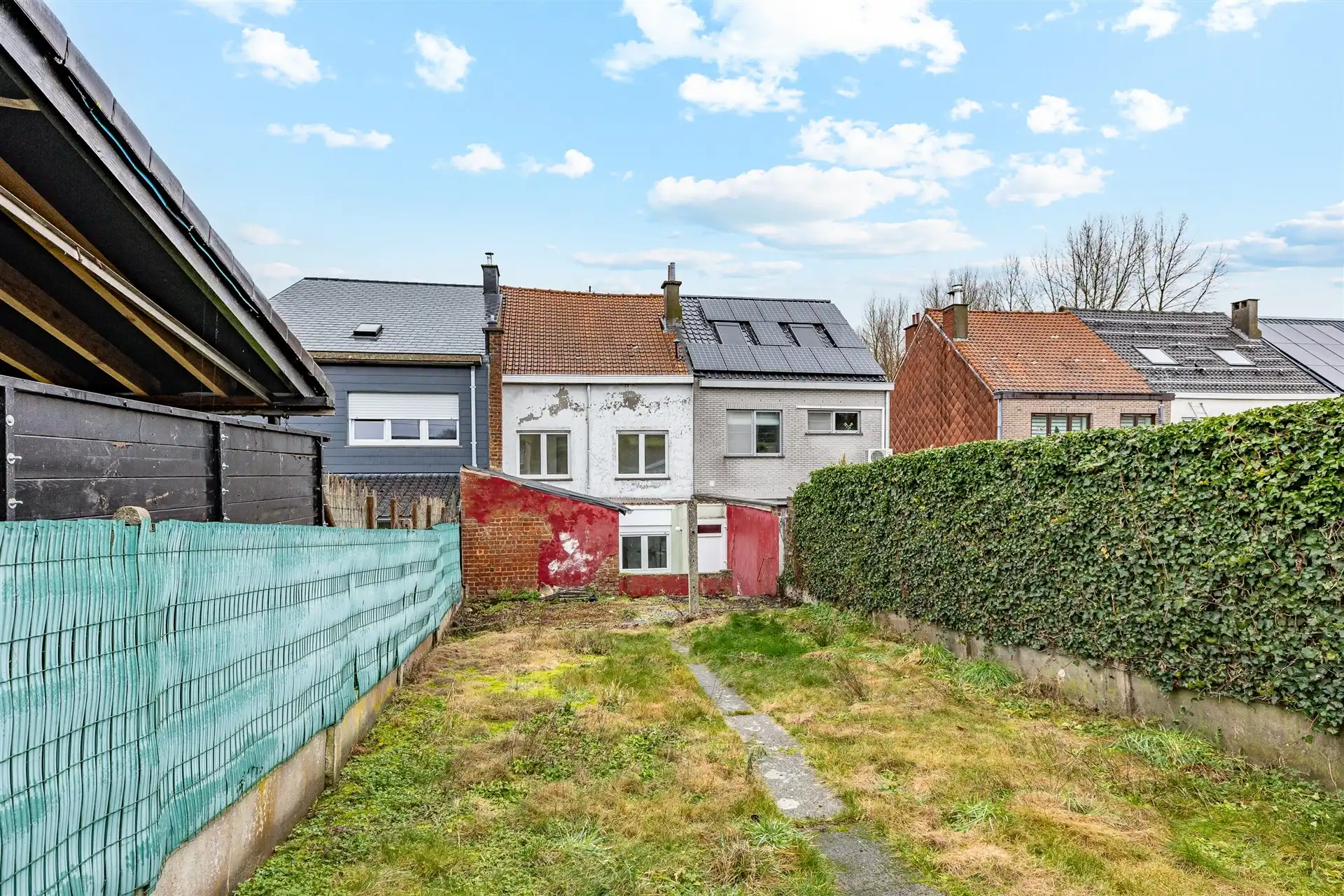 Charmante gezinswoning met tuin en zijdoorgang in rustige straat te Denderleeuw foto 20