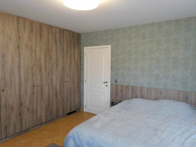Stijlvolle en energiezuinige villa met zwemvijver op een zuidgericht perceel van 15a 30ca foto 11