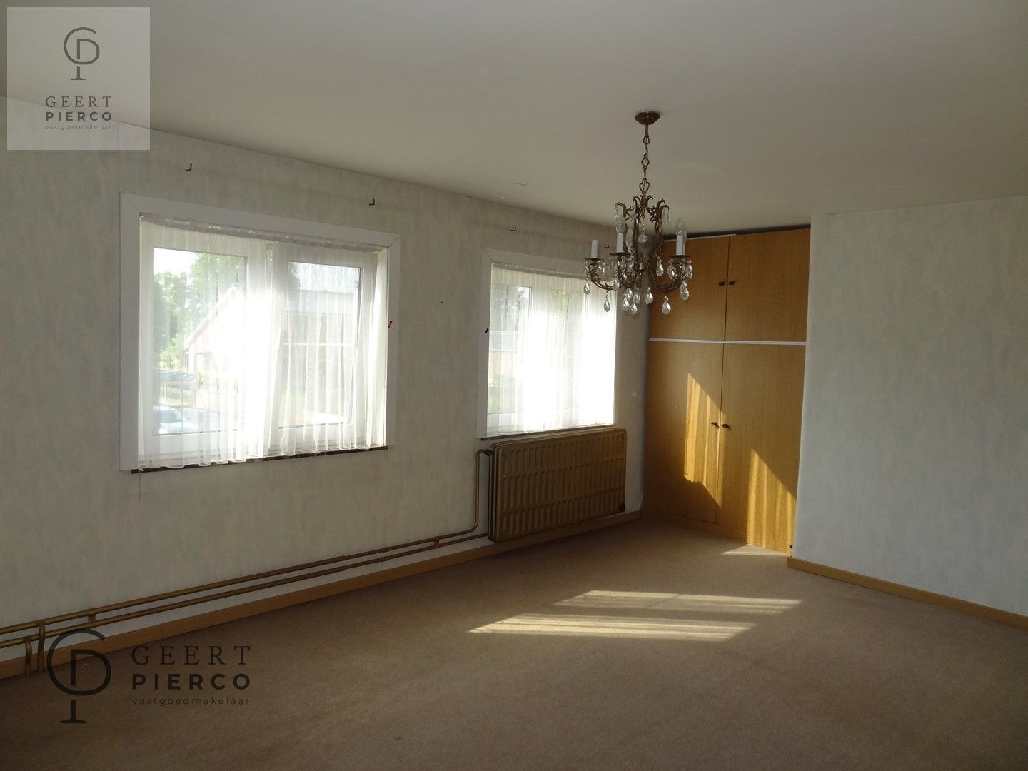 Centraal tussen Hasselt en Sint-Truiden, treffen we aan de Steenweg 56 te Alken deze te renoveren woning met drie slaapkamer, garage en tuin op een perceel van 8a03ca (breedte perceel circa 22m). foto 20