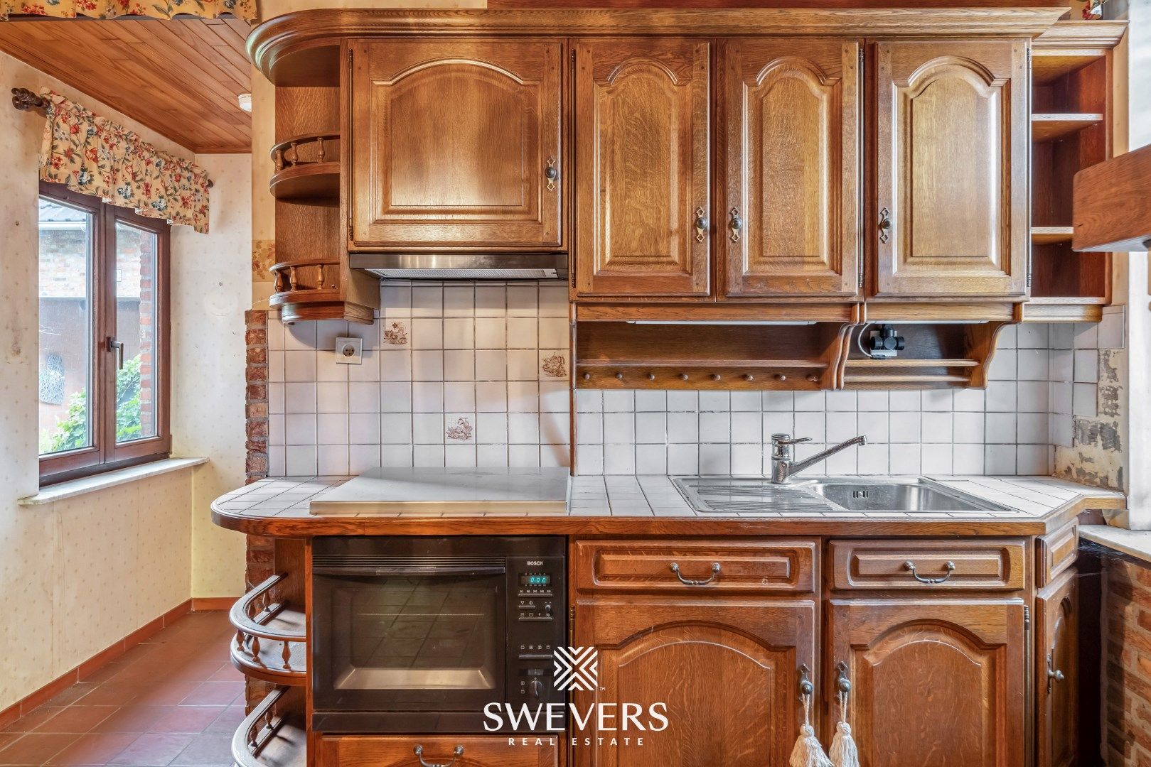 Karaktervolle woonst met renovatiepotentieel te Beverlo foto 10