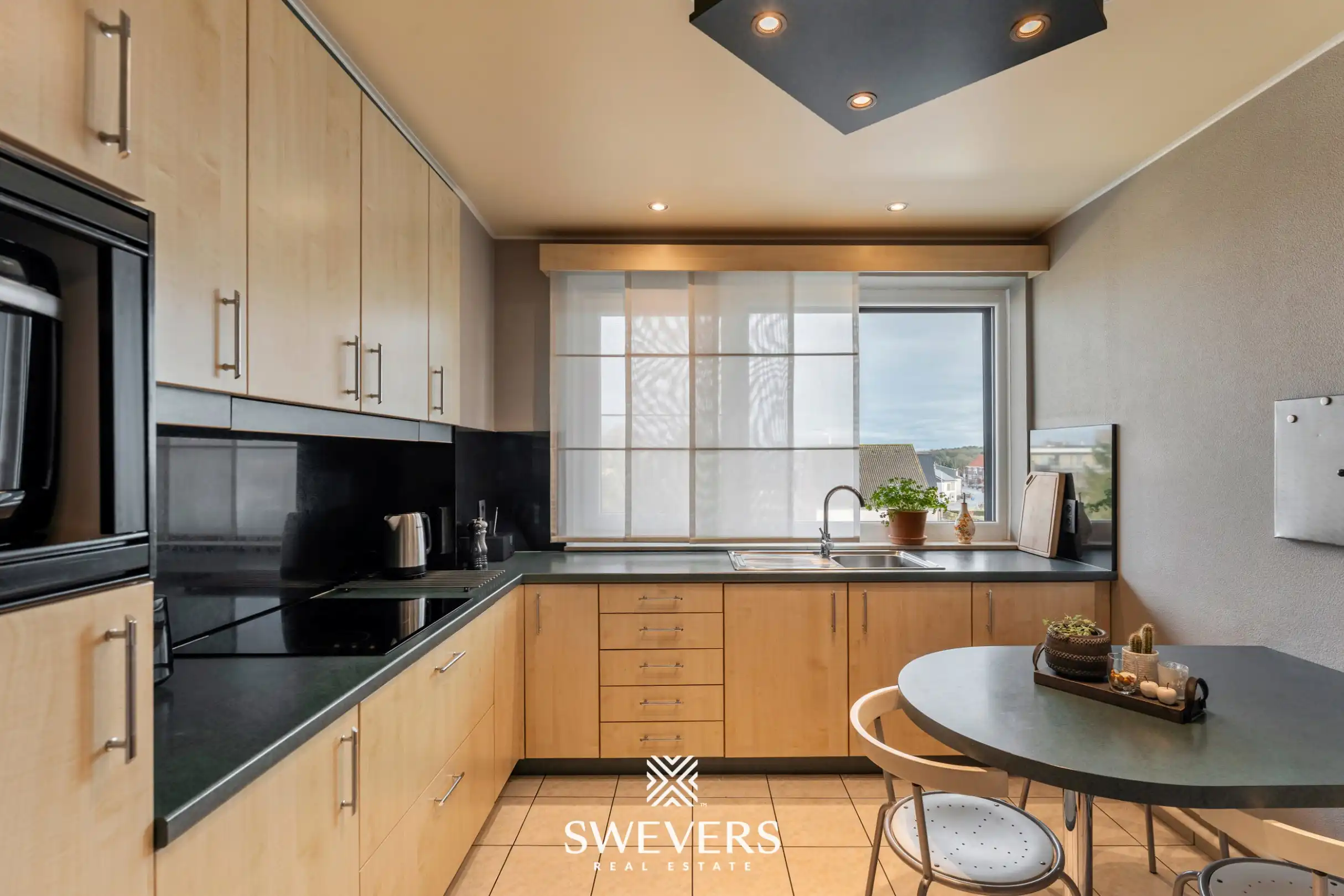 Ruim en instapklaar appartement met 2 terrassen en garage in het hart van Houthalen-Helchteren foto 9