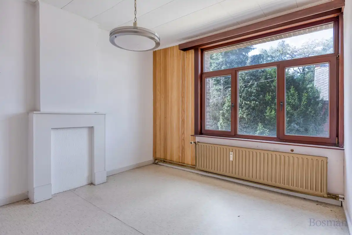 Te renoveren woning met 5 garageboxen te koop in Ham foto 15