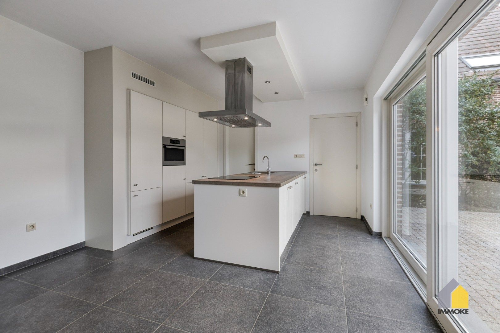 Energiezuinige woning op 3 a 14 ca met 3 slpk, 2 badkamers en knusse tuin. foto 7