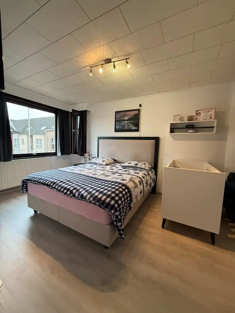 Opbrengsteigendom bestaande uit 2 halfopen woningen met garage en tuin te Hechtel. foto 33