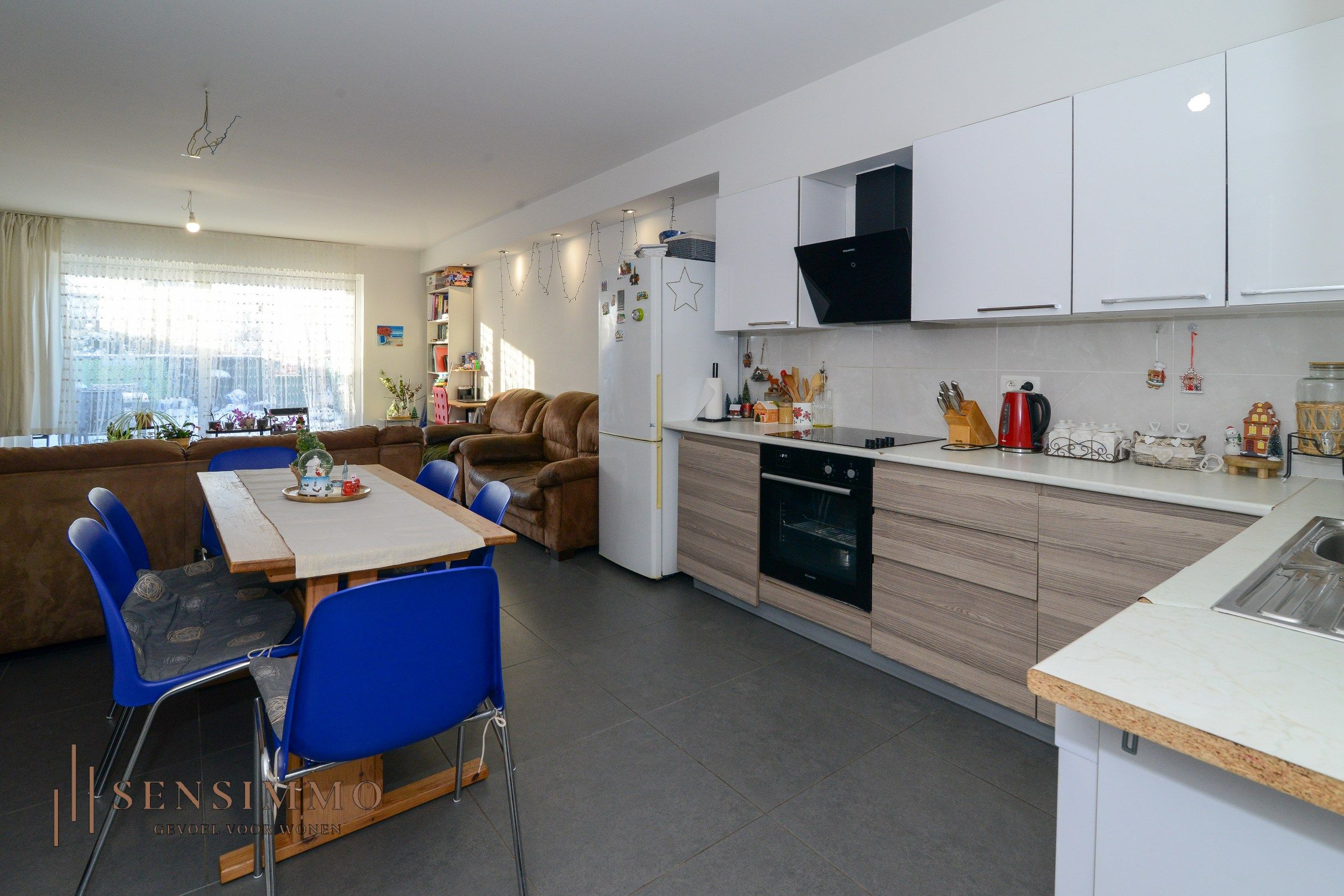 Gelijkvloers éénslaapkamer appartement met tuin, parking en kelderberging foto 4