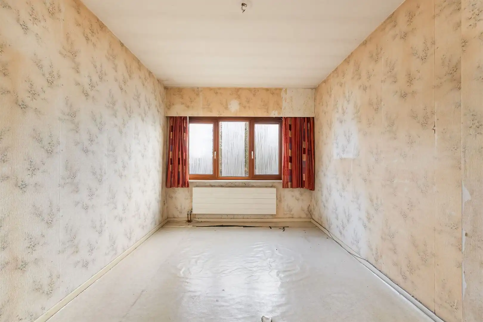 Te renoveren gezinswoning met tuin en garage in rustige centrumstraat foto 11