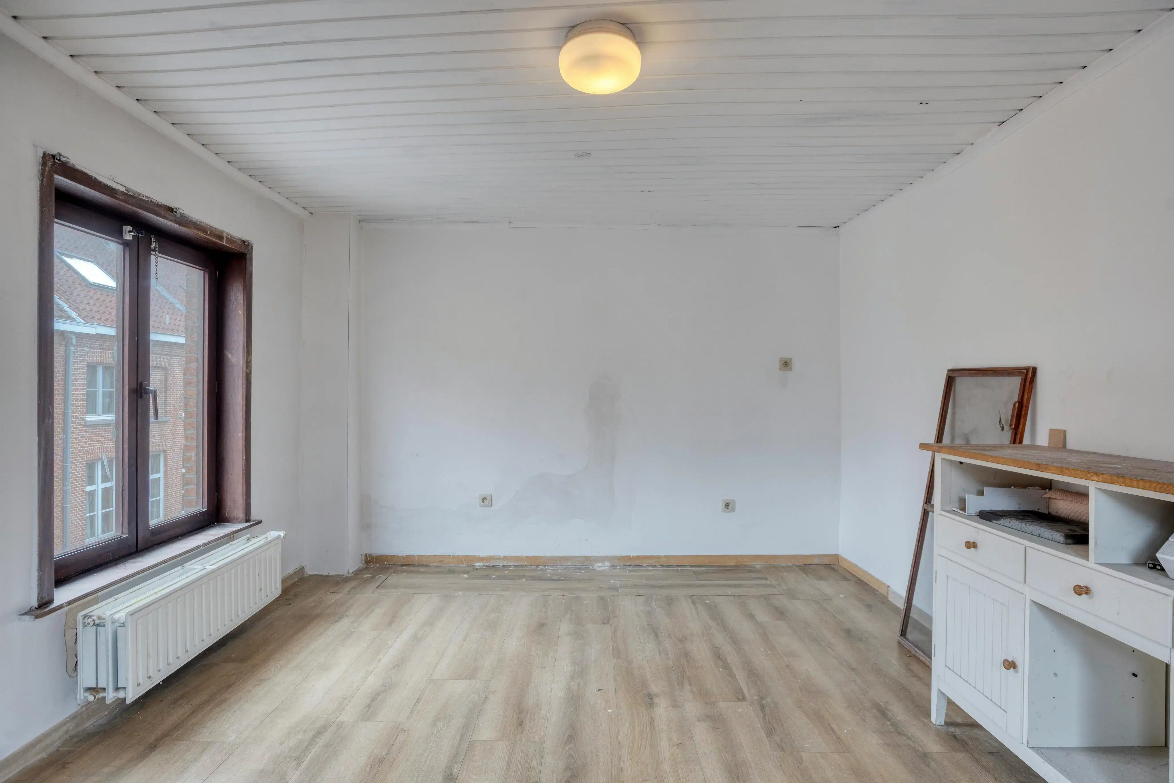 Te renoveren woning te koop in Brugge nabij de Vesten foto 7
