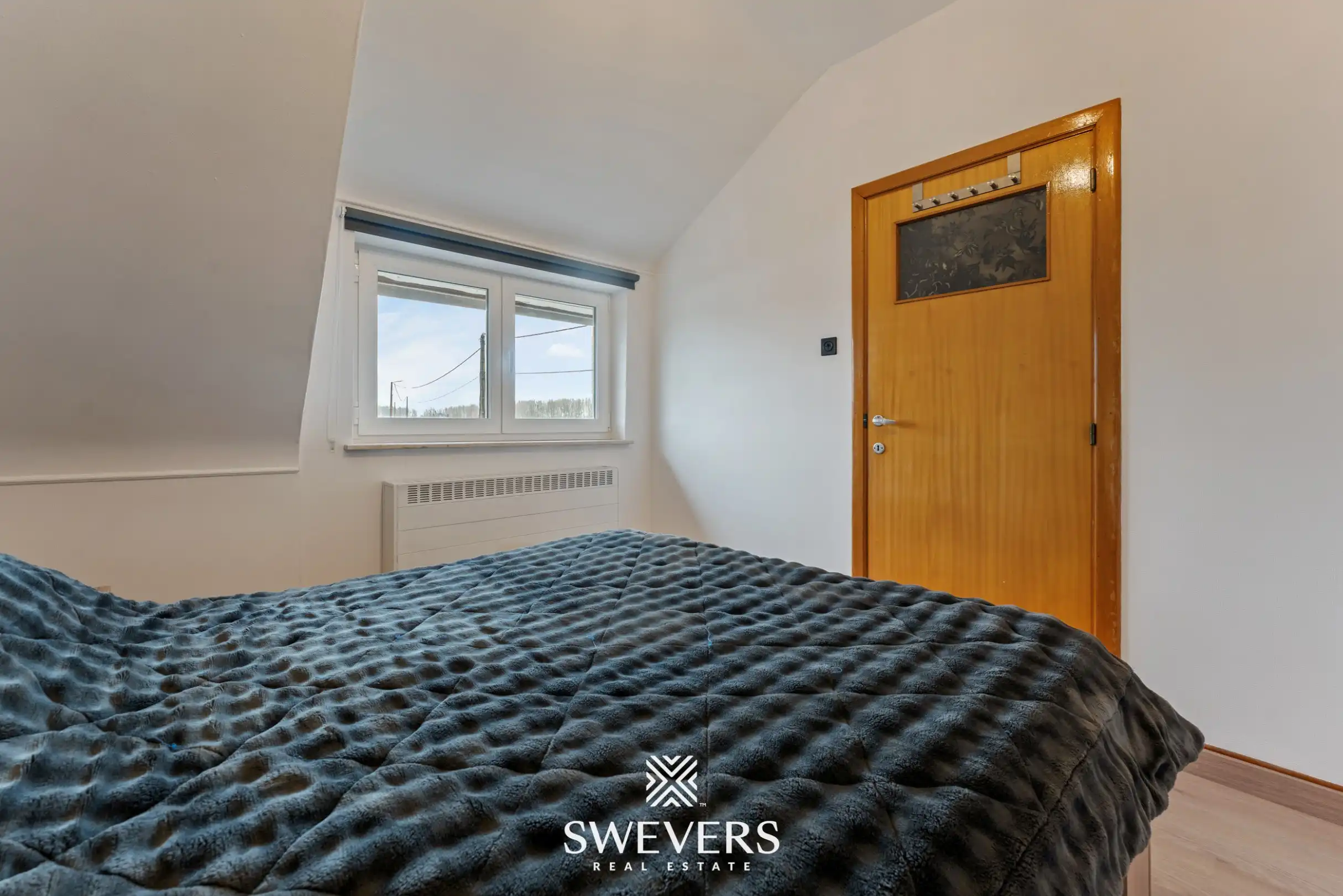 Woning met potentieel, vernieuwd dak en ramen te Borgloon foto 14