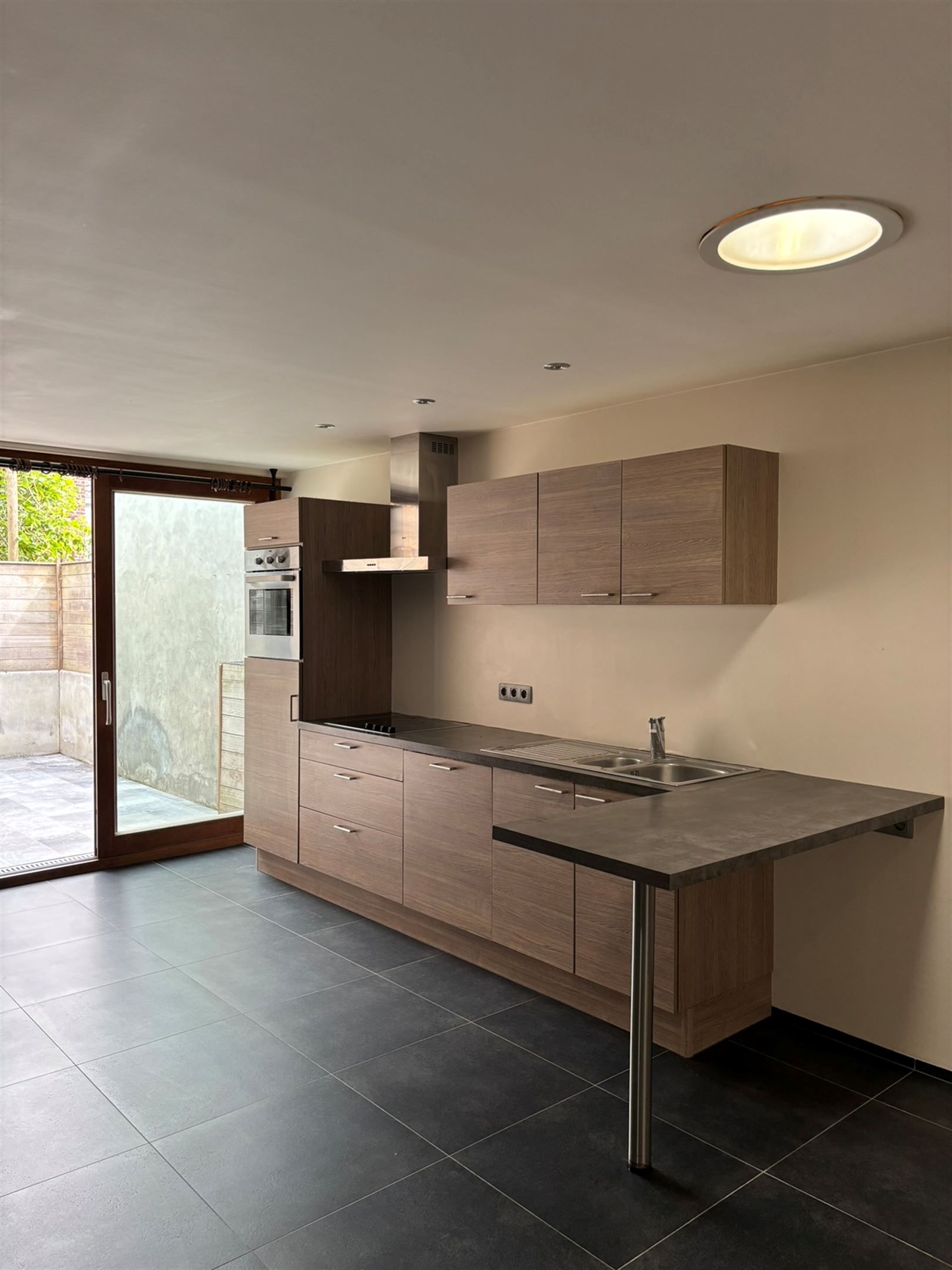 Rijwoning met 1 slaapkamer foto 4
